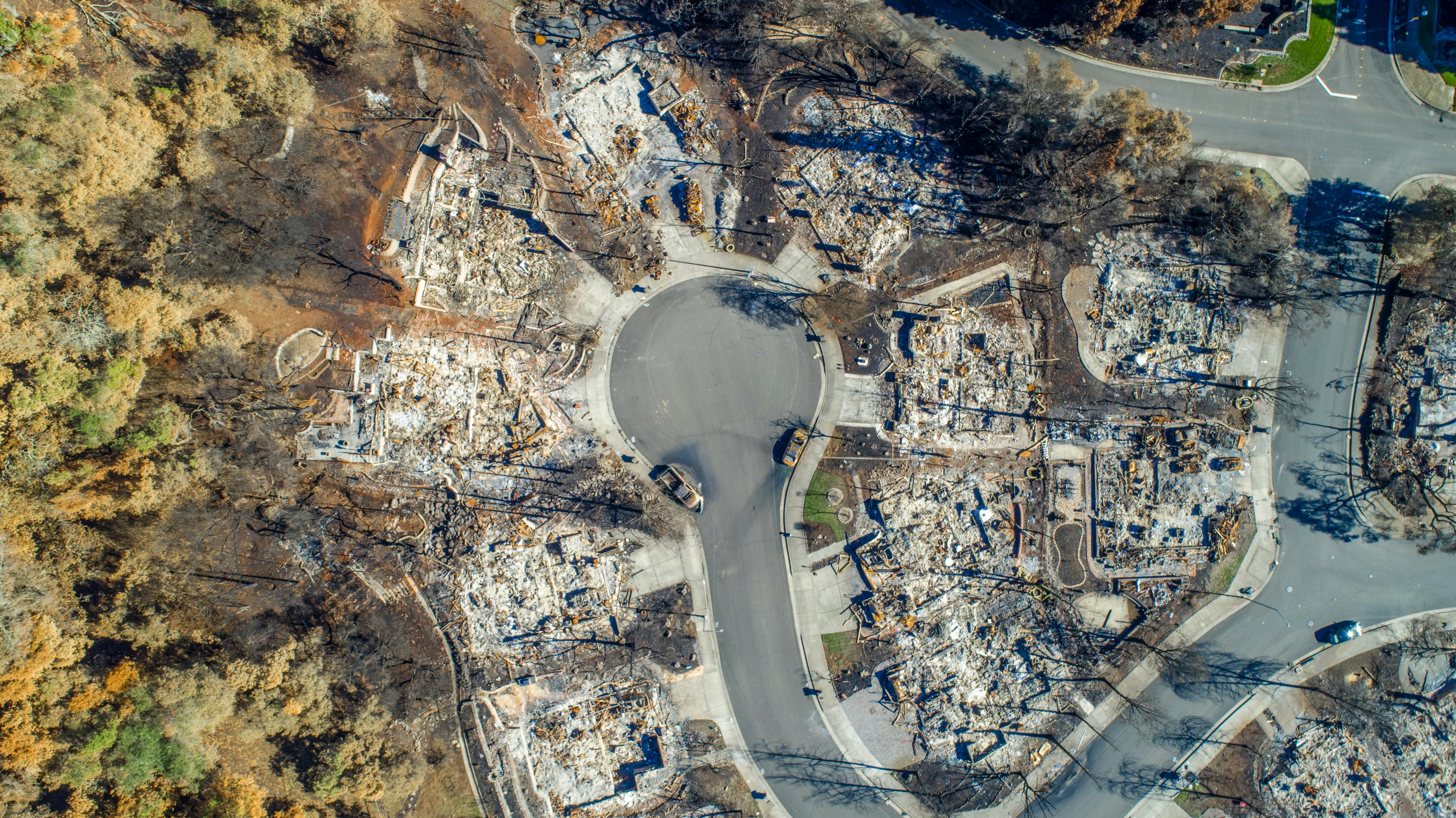 A neighborhood reduced to ash after a wildfire