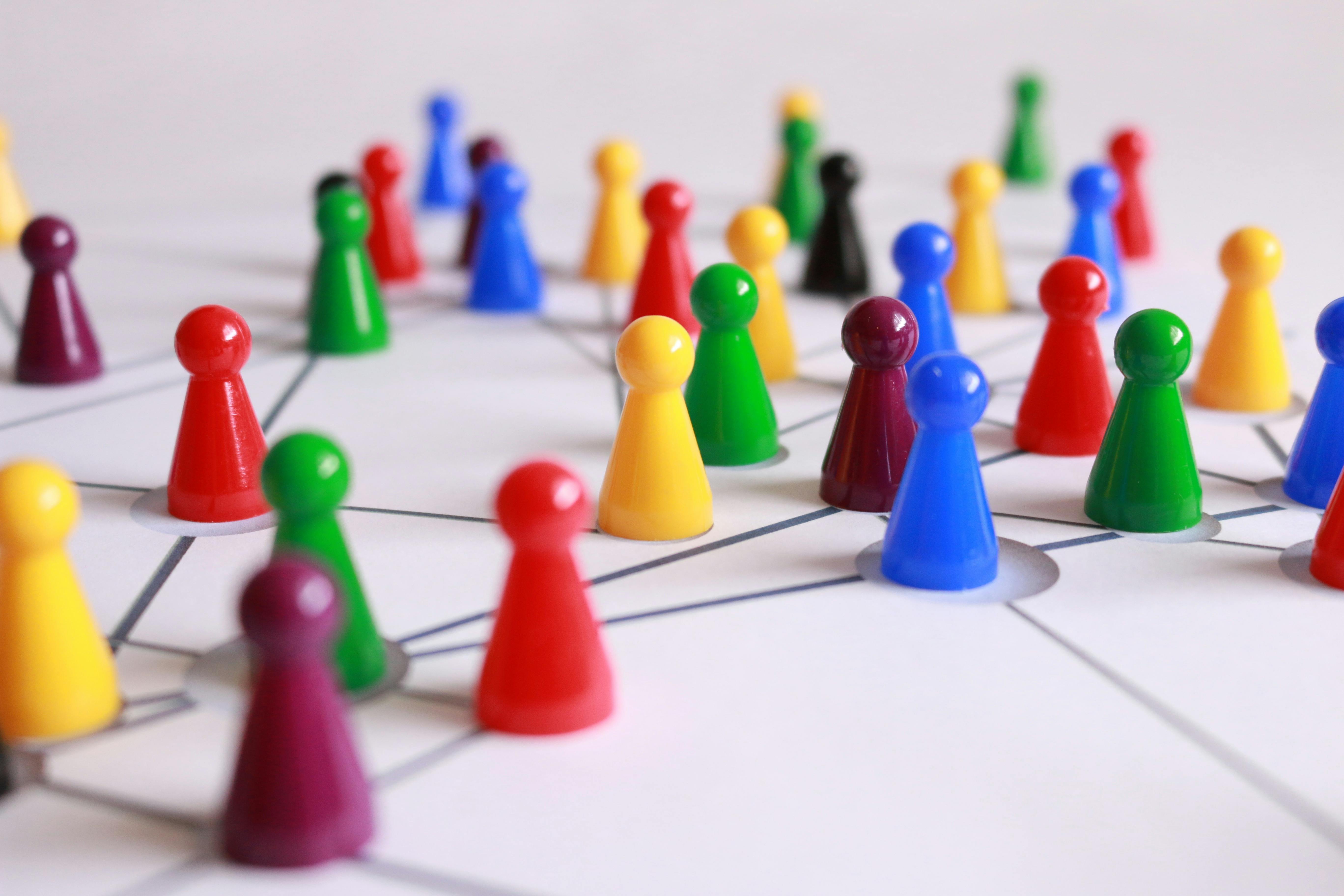 Pins representing people connected to each other