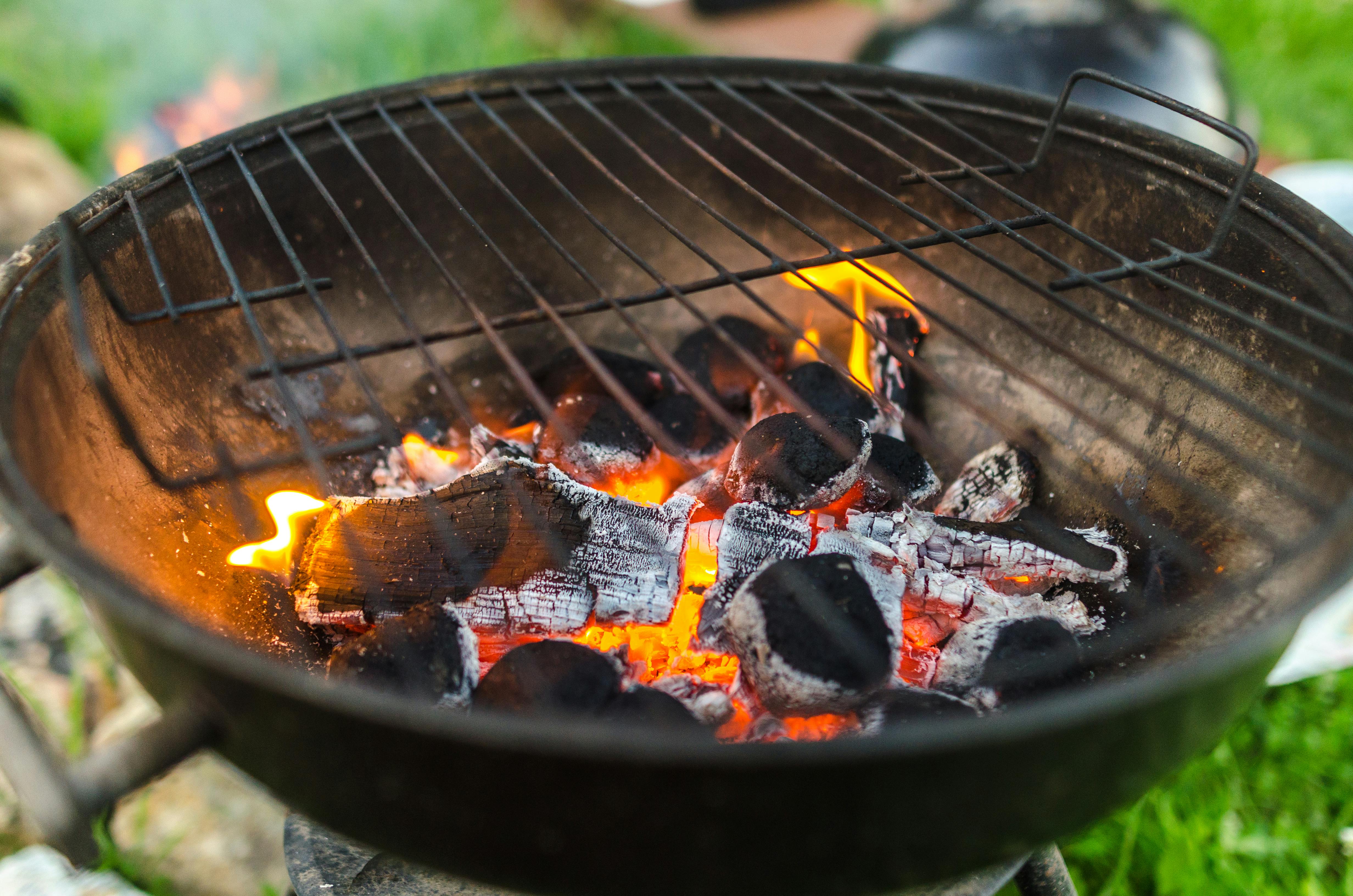 A charcoal grill heating up