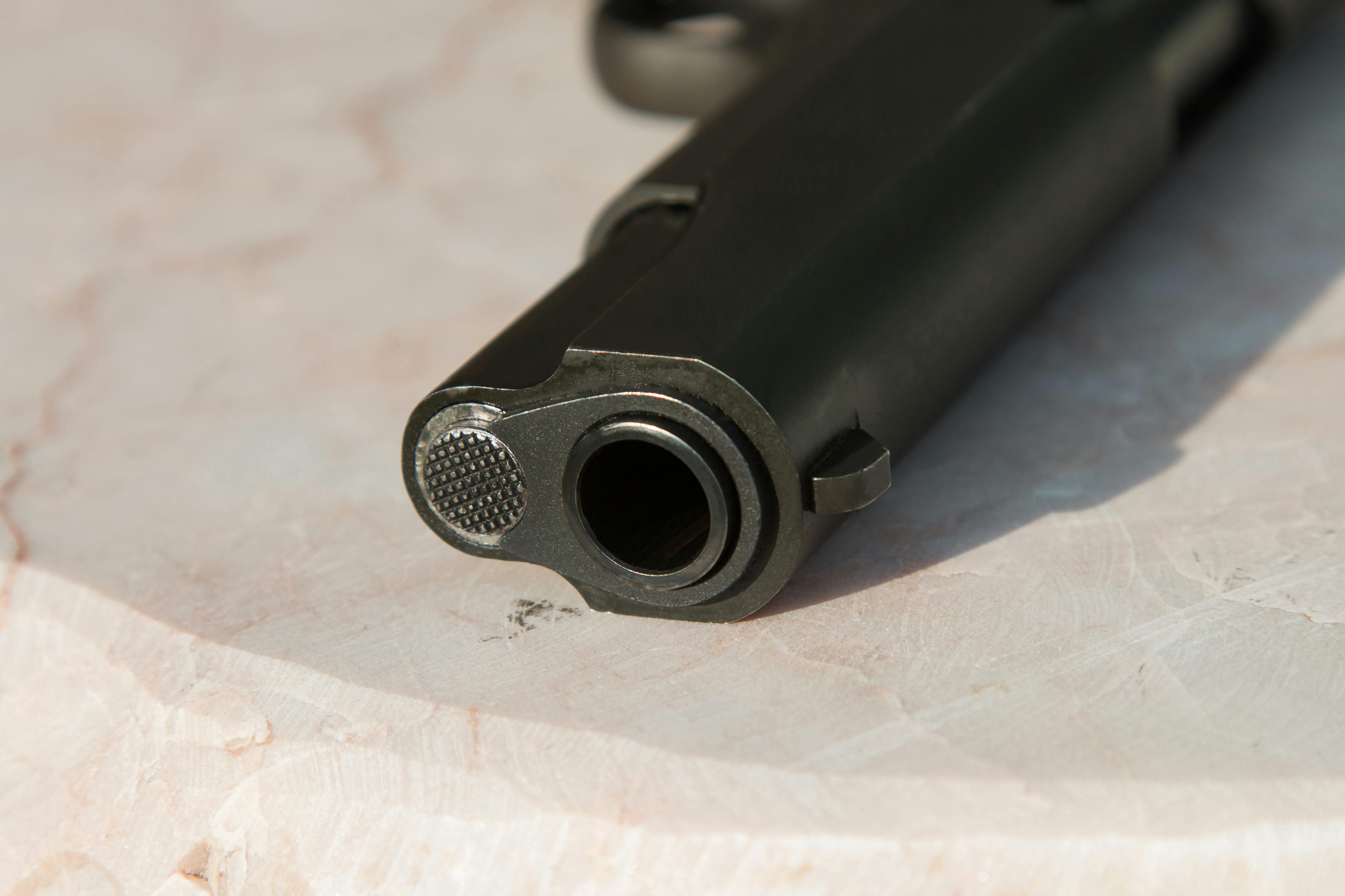 close up of the end of a gun